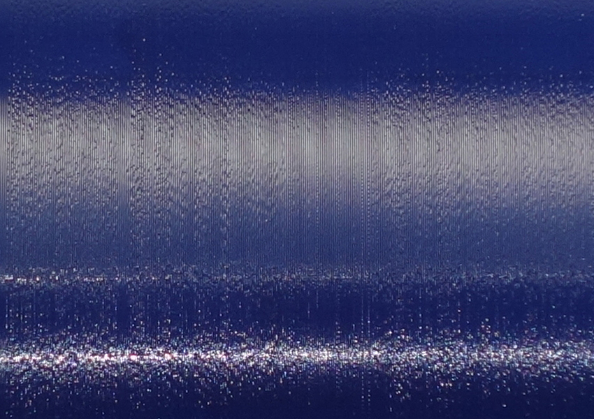 Oberfläche einer Edison-Blue-Amberol-Walze Celluloid